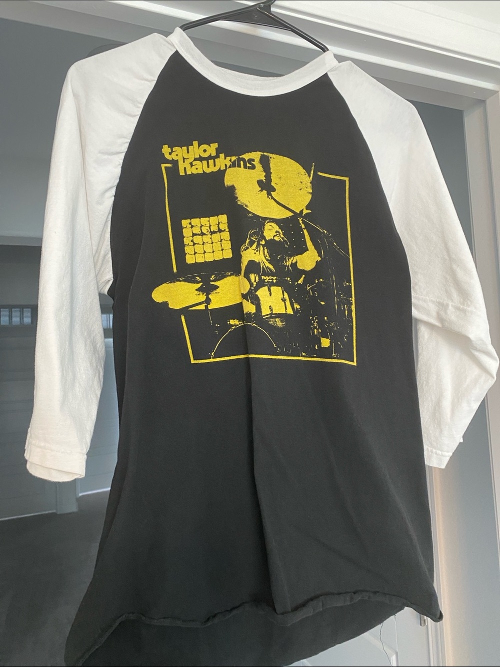 Taylor Hawkins Black & White Tribute Raglan Tee with Yellow Drum Graphic